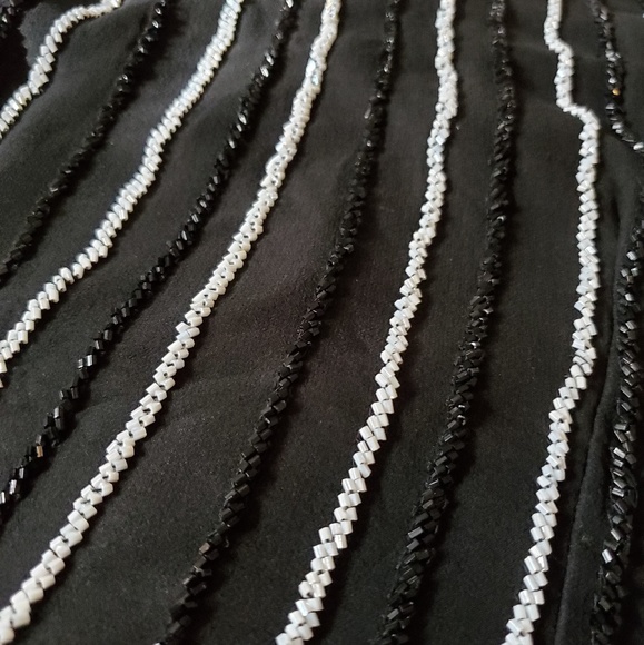 Cache 100% silk. Polyester lining. - Picture 3 of 7